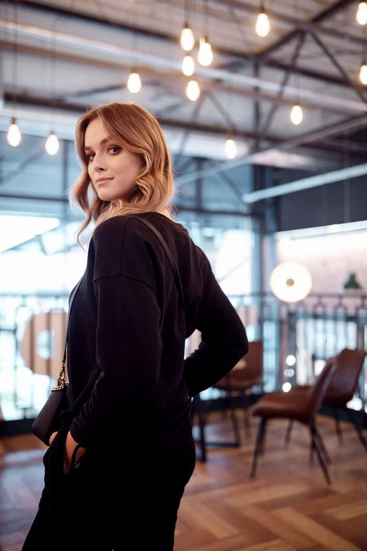 Smooth women's tracksuit with an asymmetric sweatshirt, black FI731 - Which Mark