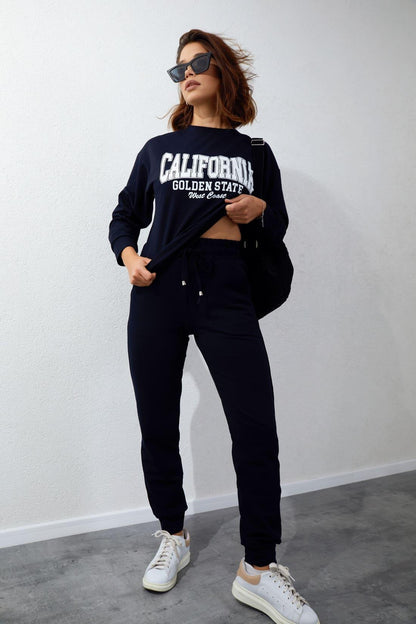 Women's tracksuit set with an application, navy blue FI728 - Which Mark